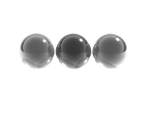 3 black glass spheres