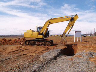 Fototapeta na wymiar heavy duty construction equipment by work site