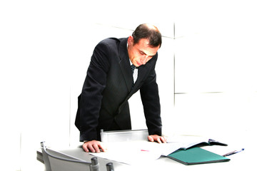 The man behind a table with documents