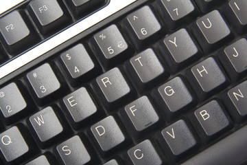 Keyboard close-up with black keys