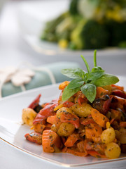 Fresh red vegetable salad with corn and basil