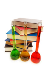 Books and tubes isolated on the white