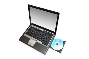 Laptop and cd-drive isolated on the white