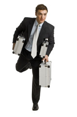 running businessman with suitcases