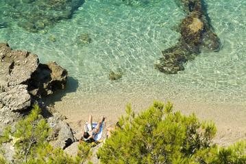 Get brown on natural beach