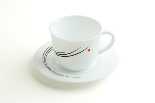 white cup on a white background with a shadow. shallow DOF