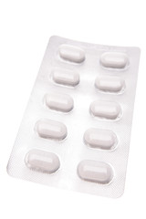 Pills in pack isolated on white