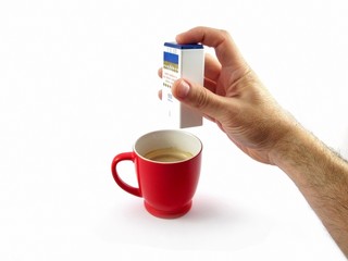 diabetes sugar in coffee cup isolated on white background