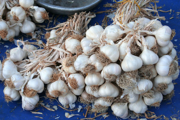 piles of garlics at bazaar