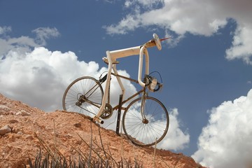 Sculpture of a downhill cycle