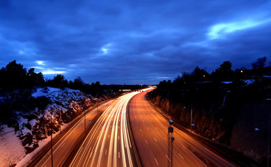 cars at night with motion blur.