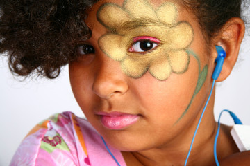 Young Girl with Flower on Face with Digital Music Player