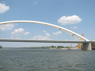 Obraz premium modern white bridge construction over the river