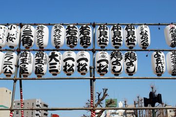 Lanterns on scaffolding near buddhist temple in Tokyo