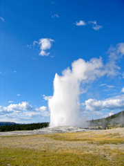 Old Faithful monumental geyser in Yellowston national park