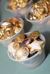 Cup of buttons on display