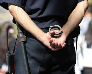 Policeman with handcuffs