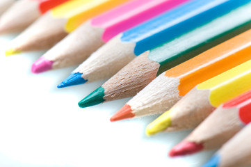 Fototapeta premium Multicolored pens on white background
