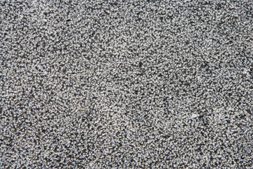 Black and white gneis rock surface background / texture