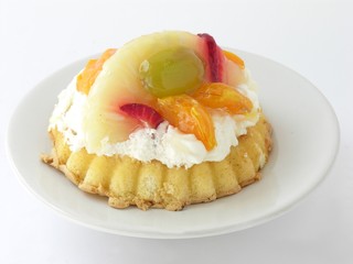 tasty cake with fruits and cream
