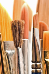  Various sized paintbrushes with shallow depth of field 