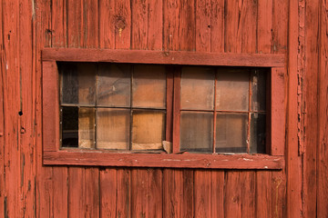 Rustic window in a red barn