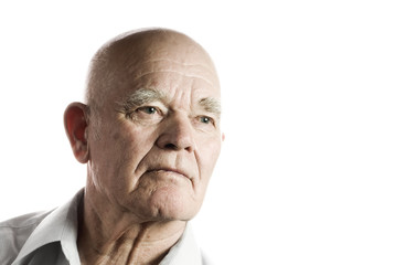 Confident looking elderly man. Isolated on white background
