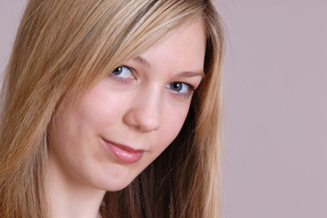 Naklejka premium attractive blonde teenage student