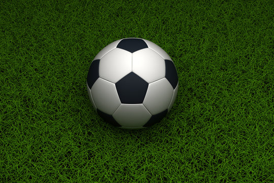soccer ball on grass background