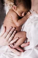 Fototapeta na wymiar Newborn sleeping child
