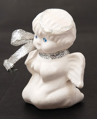 Beautiful porcelan angel in old-fashioned style