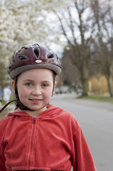 girl in bicycle helmet
