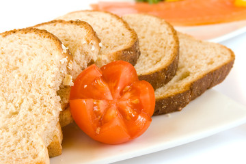 Slices of Bread with Tomato Garnish