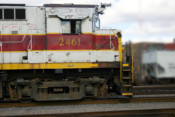 Diesel Train approaching in the rail-yard