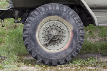 Fototapeta na wymiar military truck wheel