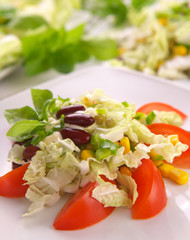 Fresh tomato salad with corn and basil