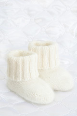 Fototapeta na wymiar Woolen socks for newborn