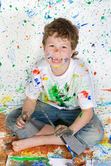 Fototapeta premium Boy playing with painting