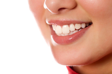 smiling young girl mouth with great teeth (isolated on white)