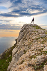 Obraz premium Active people - Person climbing a cliff