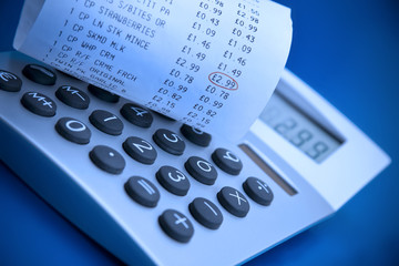 Calculator and cash register receipt