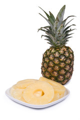 Whole and sliced pineapple
