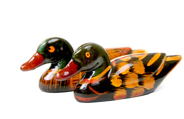 two wooden ducks