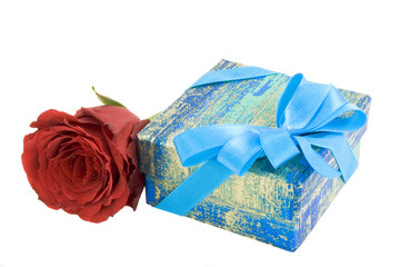 Gift box with ribbon and red rose isolated on white