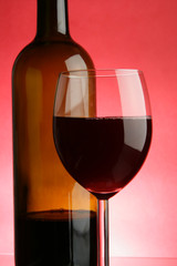 Glass and bottle of red wine