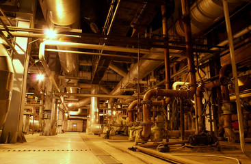 Equipment, cables and piping as found inside of a modern industr © Andrei Merkulov