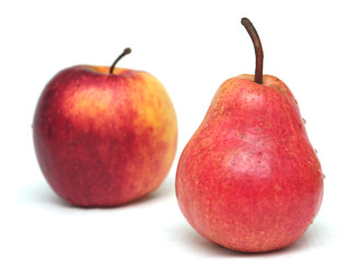 One red juicy pear and red apple