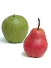 One red juicy pear and green apple