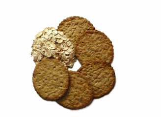 Oats and cereal crackers on white background