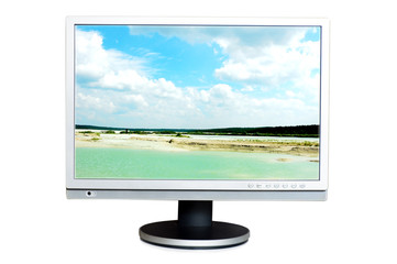 Widescreen LCD panel with beache on the screen.